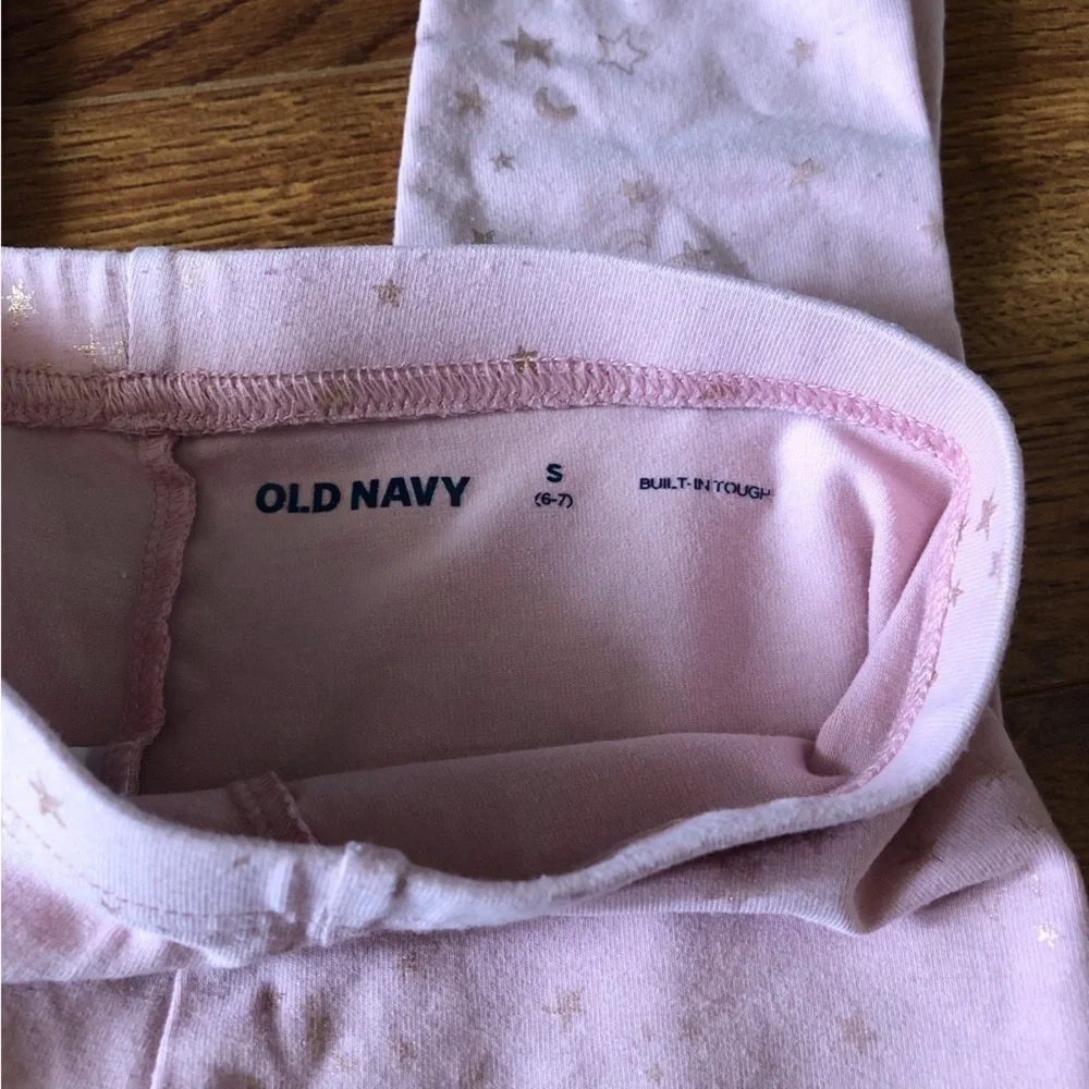 Old Navy pink star built in tough leggings in size S (6/7)